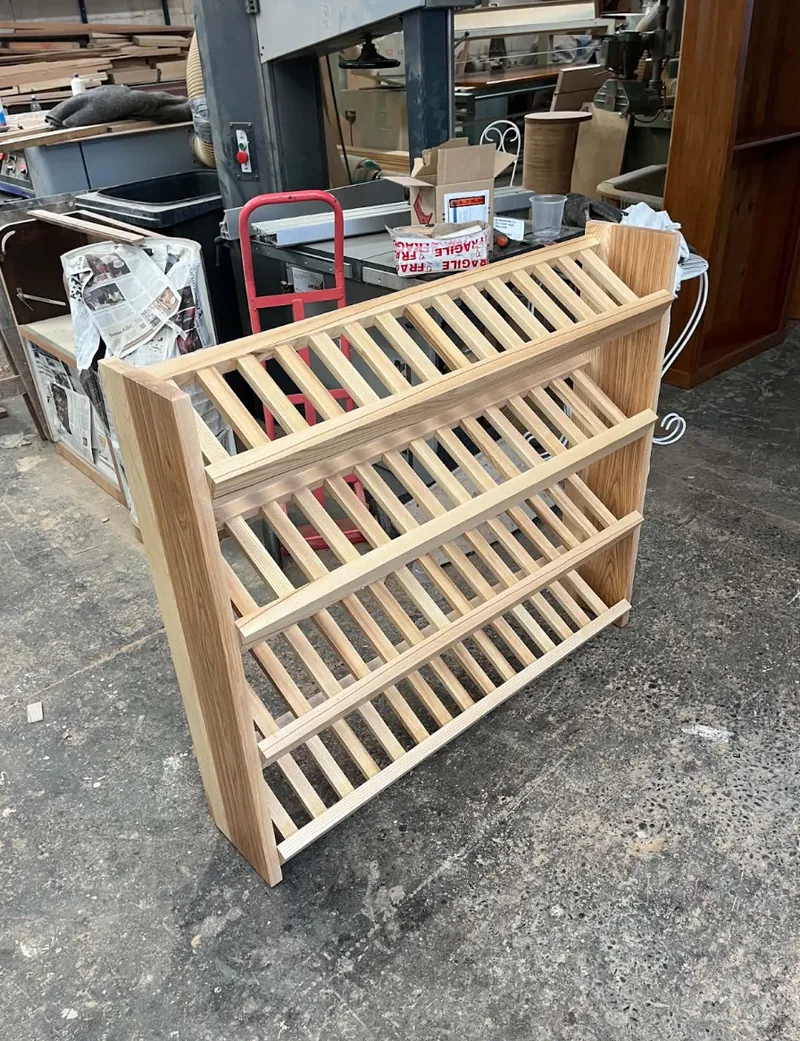 Custom wooden slatted shelving unit in the D.J. Morrison workshop, Christchurch