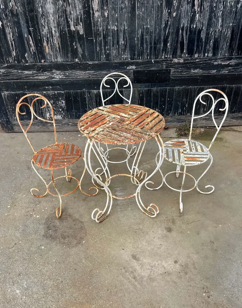 Rusty wrought iron garden table and chairs before restoration by D.J. Morrison, Christchurch
