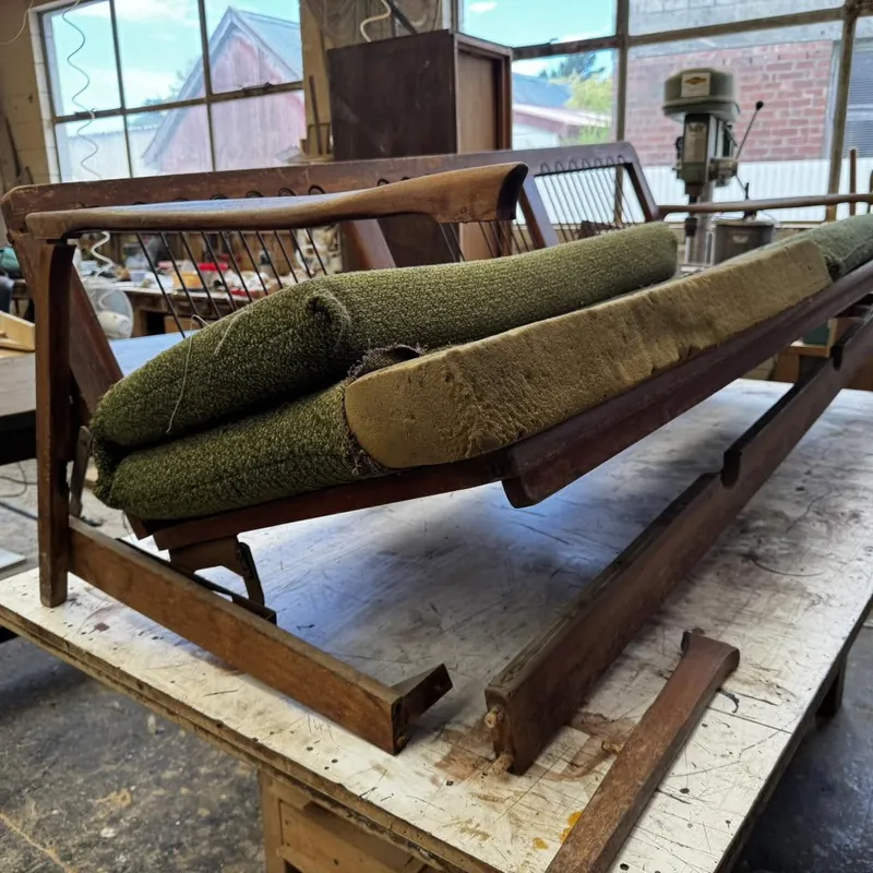 Mid century teak sofa before restoration by D.J. Morrison, Christchurch